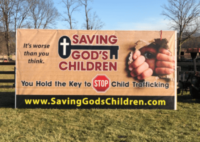 Our First 8 Foot by 18 Foot Vinyl Sign! Join Us to Save God’s Children!